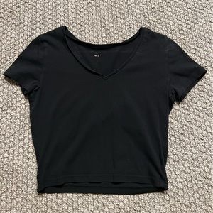 Black v-neck cropped t-shirt. Medium